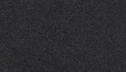 A dark grainy iron metal texture with a subtle shimmer effect, creating a sleek and industrial background for design projects.

