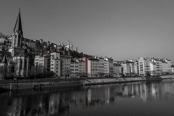 Fototapeta premium Urban scene with buildings around the River Saone, Lyon, France