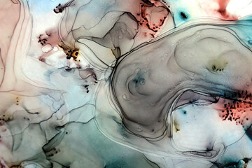 art background of colored ink stains on gray