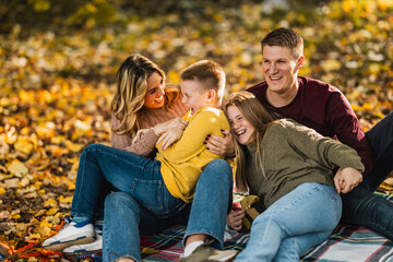 Fototapeta premium Family Having Fun Outdoors