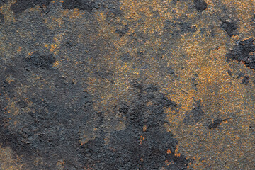 Close up of an old rusty cast iron frying pan background. Vintage cooking utensil concept