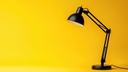 Black Desk Lamp on Yellow Background