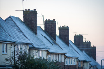 Frost snow covered british house roof in england uk