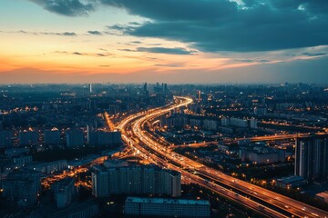 Fototapeta premium Stunning Night Cityscape Highway Traffic Lights Urban Panorama Aerial View Breathtaking Golden Hour Sunset Dramatic Cloudscape Modern City Skyline Beautiful Cityscape 