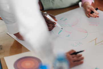 Business people analyzing venn diagram during corporate meeting