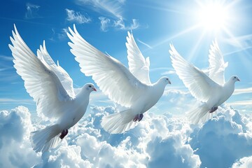 Obraz premium Three white doves soaring through a bright blue sky filled with fluffy clouds and sunlight