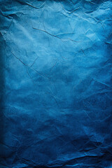 Obraz premium Abstract background with a tonal blue gradient and paper creases, old blue paper background with wrinkles, crumpled blue old paper