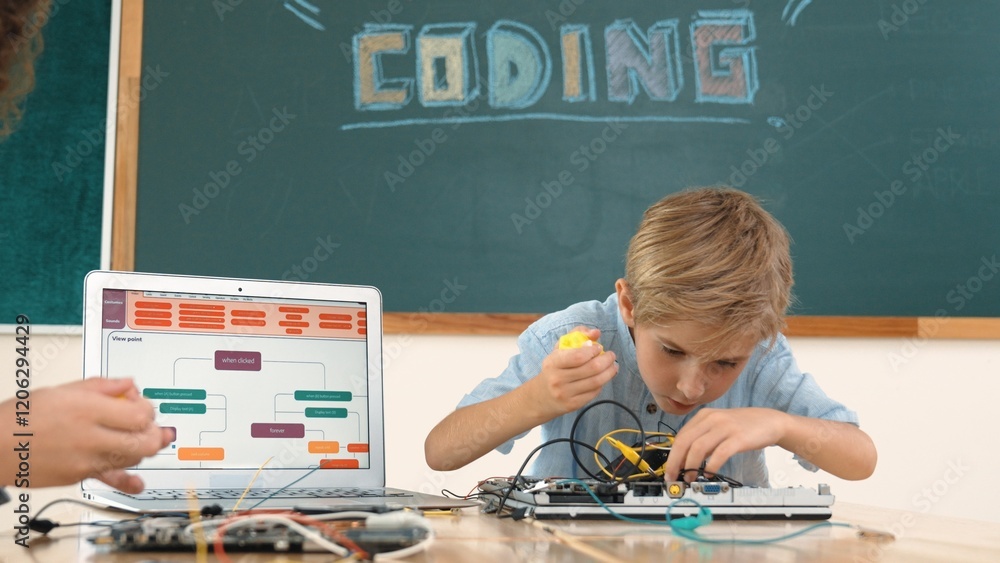 Aufkleber caucasian smart boy fixing main board by using screwdriver at stem technology lesson while smiling s