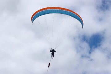 Paraglider being towed by a winch	
