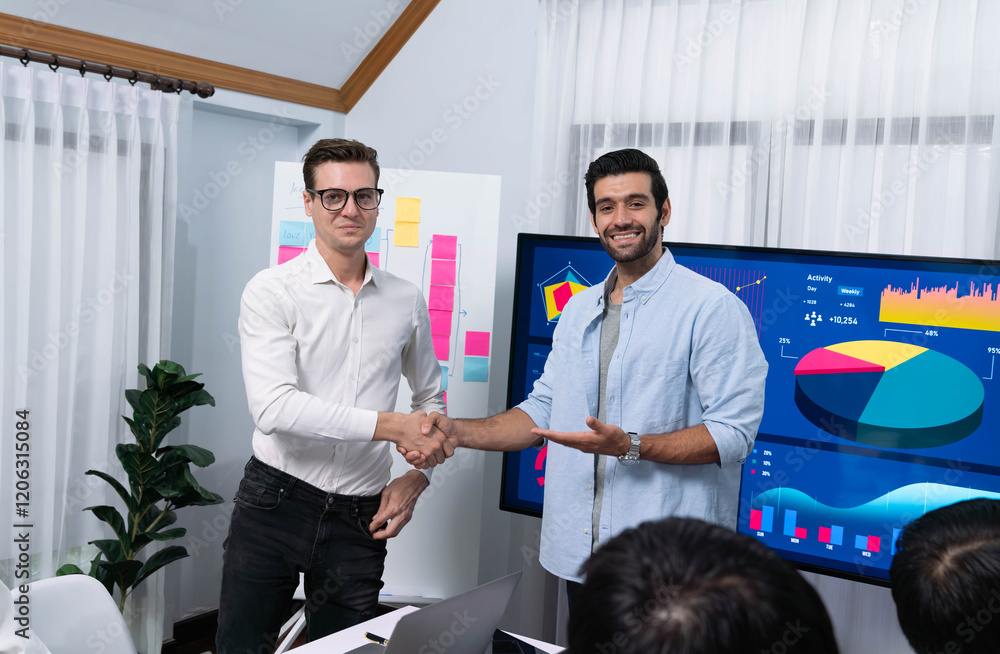 Fototapete analyst team leader shake hand with his colleague after successful data analysis meeting using finte