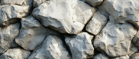 Limestone texture featuring smooth white and gray rocks in a natural setting