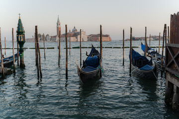 Gondolas. Gondolas parked on the canal without people.