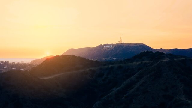 Sunset over Hollywood Hills showcasing the iconic Hollywood sign in Los Angeles skyline