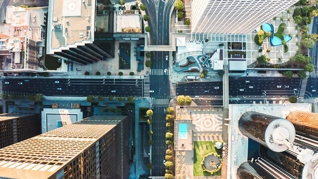 Explore the vibrant streets and modern architecture of downtown Loa Angeles from an aerial perspective, showcasing city life and urban design