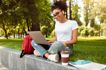 Modern Education. Black Girl Using Laptop Computer Learning Online Having Lesson Via Video Call...