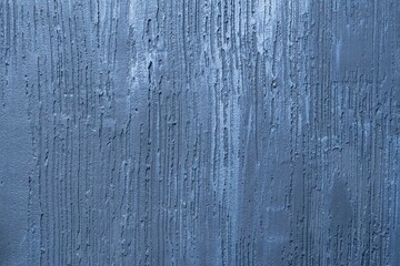 The texture of a concrete wall with anthracite and blue decorative plaster. Abstract background...