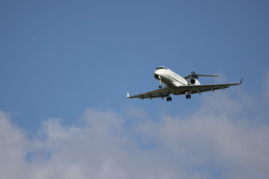 Landing Bombardier Challenger 300 on a Cloudy Afternoon
