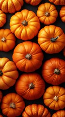 A seamless background showcasing fresh pumpkins in vibrant orange hues. This pattern captures the essence of autumn with its organic texture and rich seasonal tones.