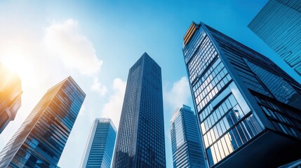 Obraz premium Modern Cityscape with Skyscrapers Reaching Towards a Bright Blue Sky with Fluffy Clouds in Urban Landscape