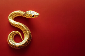 Fototapeta premium 3D gold snake on red background celebrating Chinese New Year