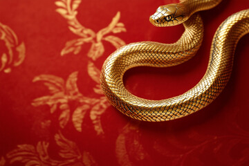 Obraz premium 3D gold snake on red background celebrating Chinese New Year