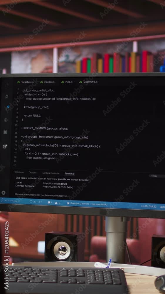 Fototapete Vertical video Code typed into PC entering commands and running script, panning shot of monitor on desk. Computer display in apartment used for fixing errors in application and implementing features