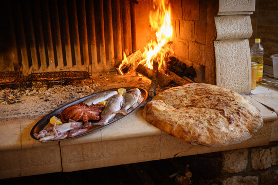 Traditional Dalmatian Fireplace with Fresh Seafood Platter and Homemade Bread