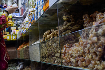 Gum arabic and spices displayed in a local bazaar market in Marrakesh