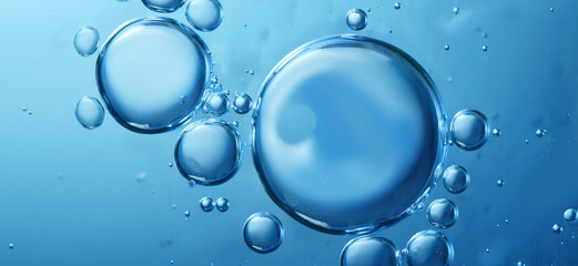 Blue drops and bubbles of clear water, blue abstract water background