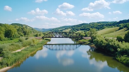 Obraz premium River bridge landscape, summer day, scenic valley, calm water reflection