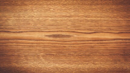 Fototapeta premium A close-up view of a warm, textured wooden surface showcasing natural grain patterns, perfect for backgrounds and design elements.