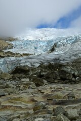 the sermeq glacier and glacial melt at the end of the tasermuit fjord on a sunny summer day near nanortalik, in southern greenland