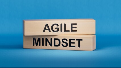 Agile mindset symbol. Concept words Agile mindset on wooden blocks. Business flexible and agile mindset concept. Copy space.3D rendering on blue background.