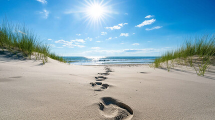 A wide beach scene with footprints trailing to the ocean, framed by dunes and sea grass swaying in the breeze, symbolizing a peaceful journey