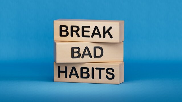 Break bad habits symbol. Concept words Break bad habits on wooden blocks.Medicine and Break bad habits concept.Copy space.3D rendering on blue background.