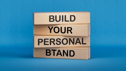 Build your personal Brand symbol. Concept words Build your personal Brand on wooden blocks.Business and Build your personal Brand concept.3D rendering on blue background.