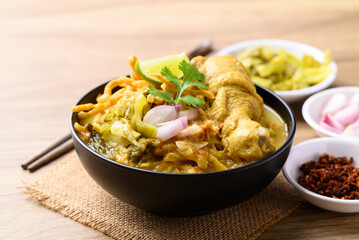 Northern Thai food (Khao Soi), Spicy curry noodles soup with chicken, Local Thai food