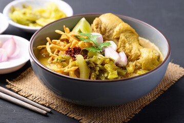 Northern Thai food (Khao Soi), Spicy curry noodles soup with chicken, Local Thai food