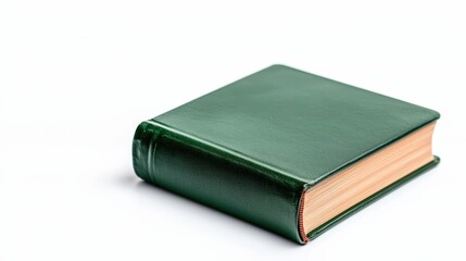 Green leather book with wooden cover on a table in a well-lit room