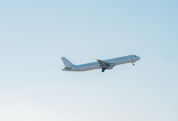 White passenger airplane flying in the sky amazing clouds in the background - Travel by air transport at japan, Travel.