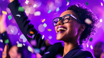 A joyful celebration with confetti and a smiling woman in glasses, exuding happiness.