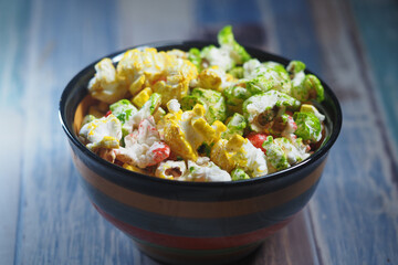 A Bowl Filled with Colorful and Delicious Gourmet Popcorn Treats