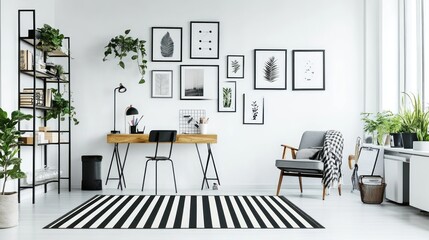 Modern minimalist home office with black and white decor, plants, and gallery wall
