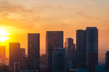 Fototapeta premium Panoramic skyline and modern commercial buildings with sunset views