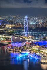 Stunning Nightscape of Singapore Skyline with Ferris Wheel