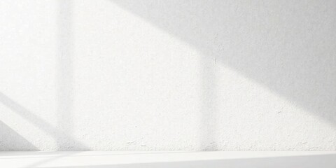 Serene Minimalist White Wall with Sunlight Shadows, Ideal for Product Placement or Background Use