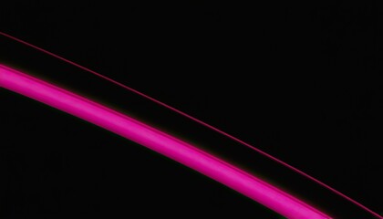 Fototapeta premium Glowing pink neon rays on a black background 
