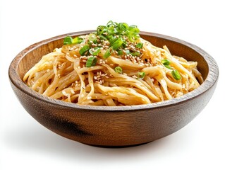 Sesame noodles in wooden bowl, garnished with green onions.