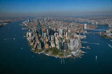 Panoramic Aerial View of Lower Manhattan with Iconic Skyline, Brooklyn Bridge, and Surrounding...