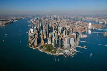 Panoramic Aerial View of Lower Manhattan with Iconic Skyline, Brooklyn Bridge, and Surrounding...